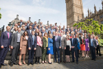 Nigel Huddleston and new MPs outside Parliament