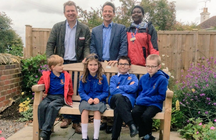Nigel Huddleston MP with pupils of Pebworth First School