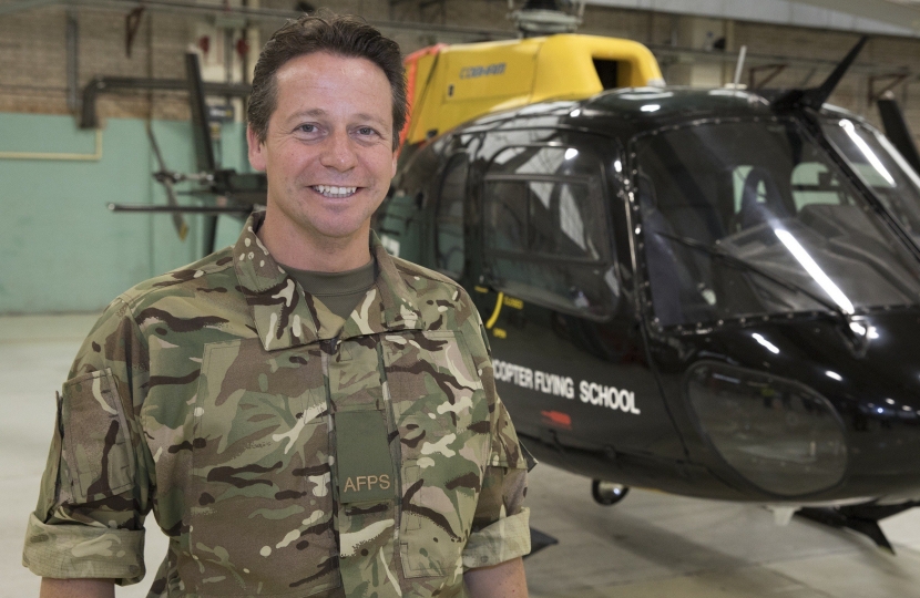 Nigel Huddleston MP at helicopter flying school