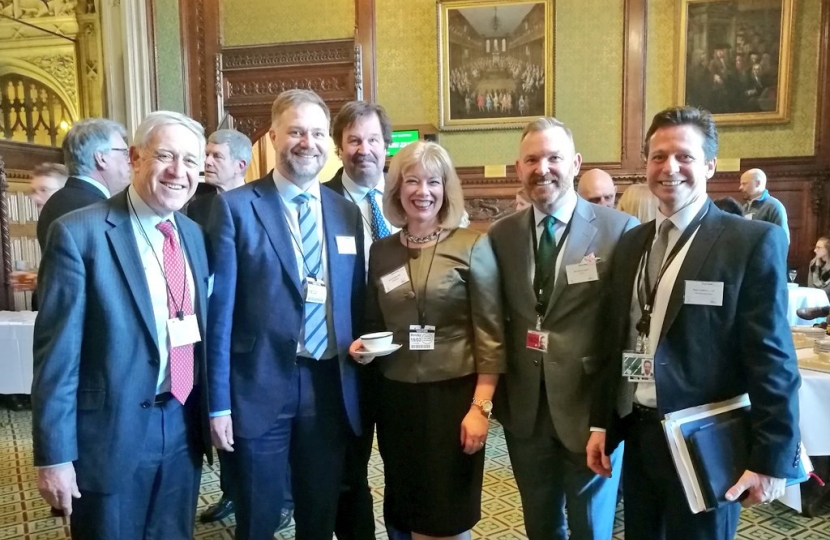 Nigel Huddleston MP with tourism industry representatives at the Tourism Alliance parliamentary reception