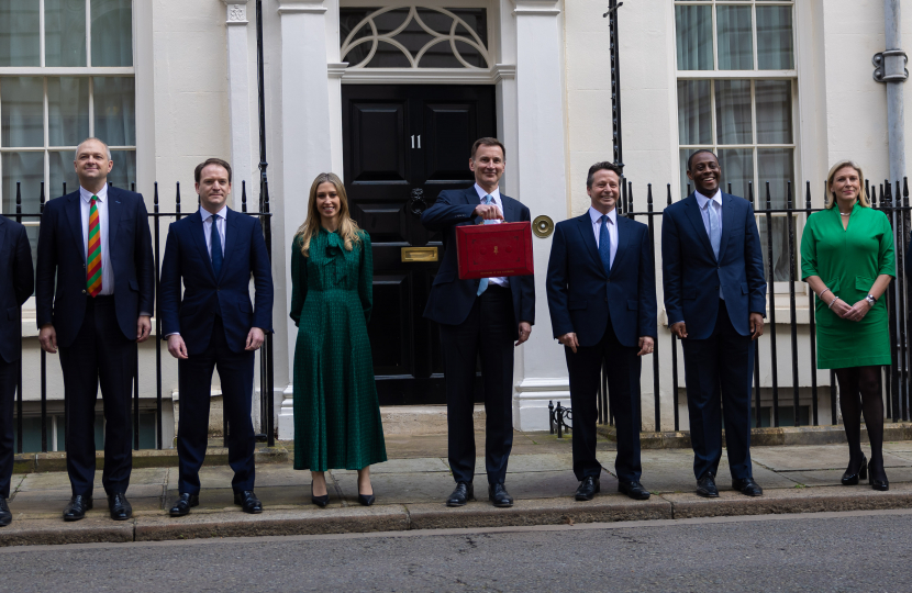 The Treasury team poses in front of No. 11 Downing Street