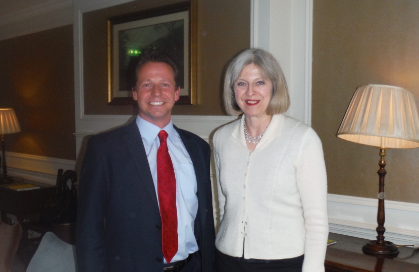Nigel Huddleston with Theresa May