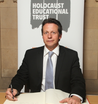 Nigel Huddleston MP signing Book of Commitment