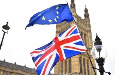 Union Jack and EU flag outside Parliament