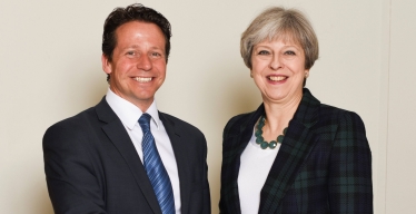 Nigel Huddleston MP with Theresa May