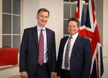 Nigel Huddleston MP with the Chancellor of the Exchequer, Jeremy Hunt MP.