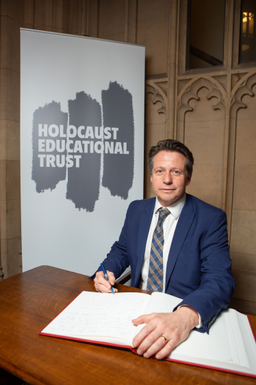 Nigel Huddleston MP Signs Book of Commitment