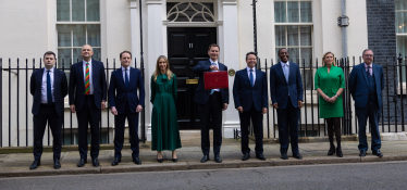 The Treasury team poses in front of No. 11 Downing Street